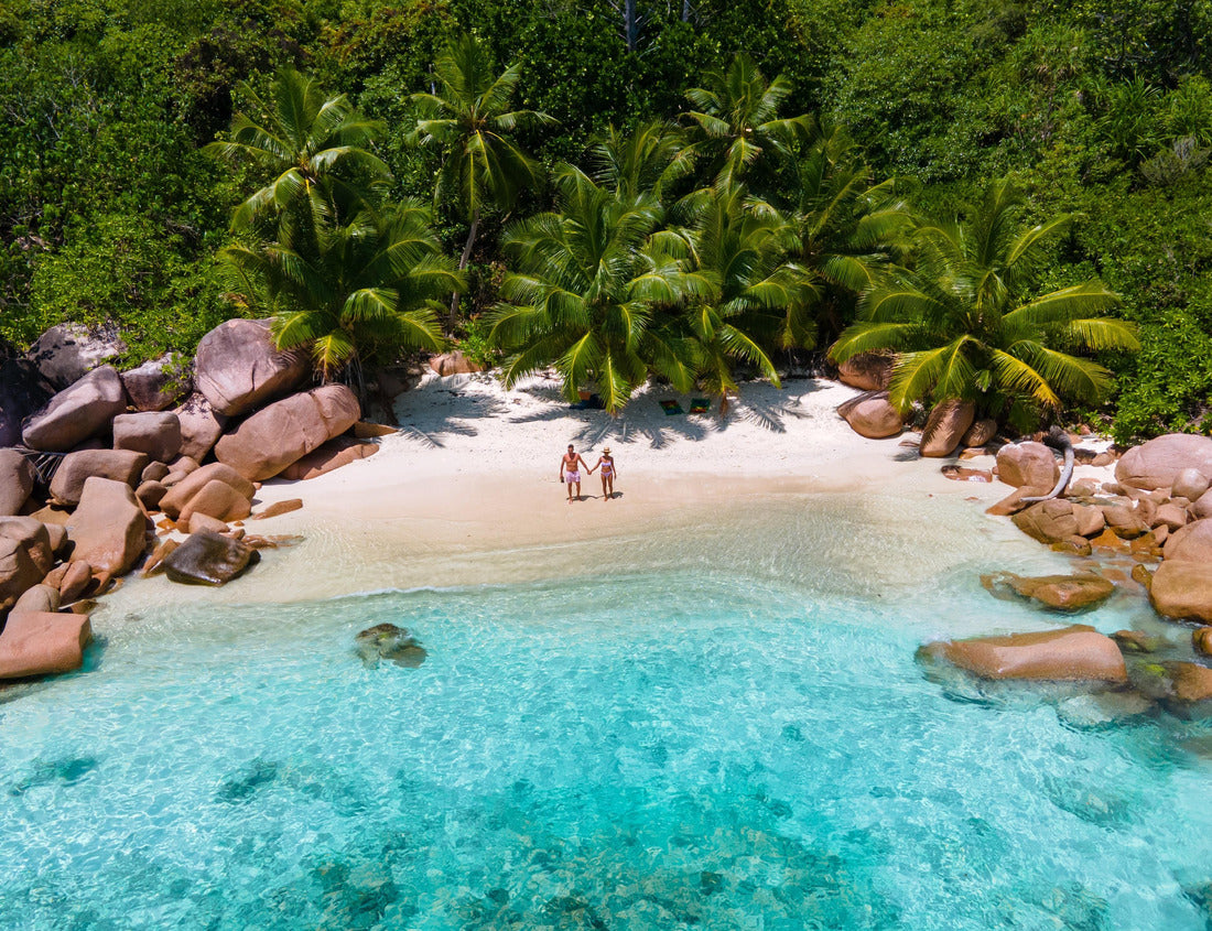Noah Jigsaw Puzzle Anse Lazio Praslin Seychelles, a young couple of men and women on a tropical beach during a luxury vacation in Seychelles. Tropical beach Anse Lazio Praslin Seychelles 1000 pieces