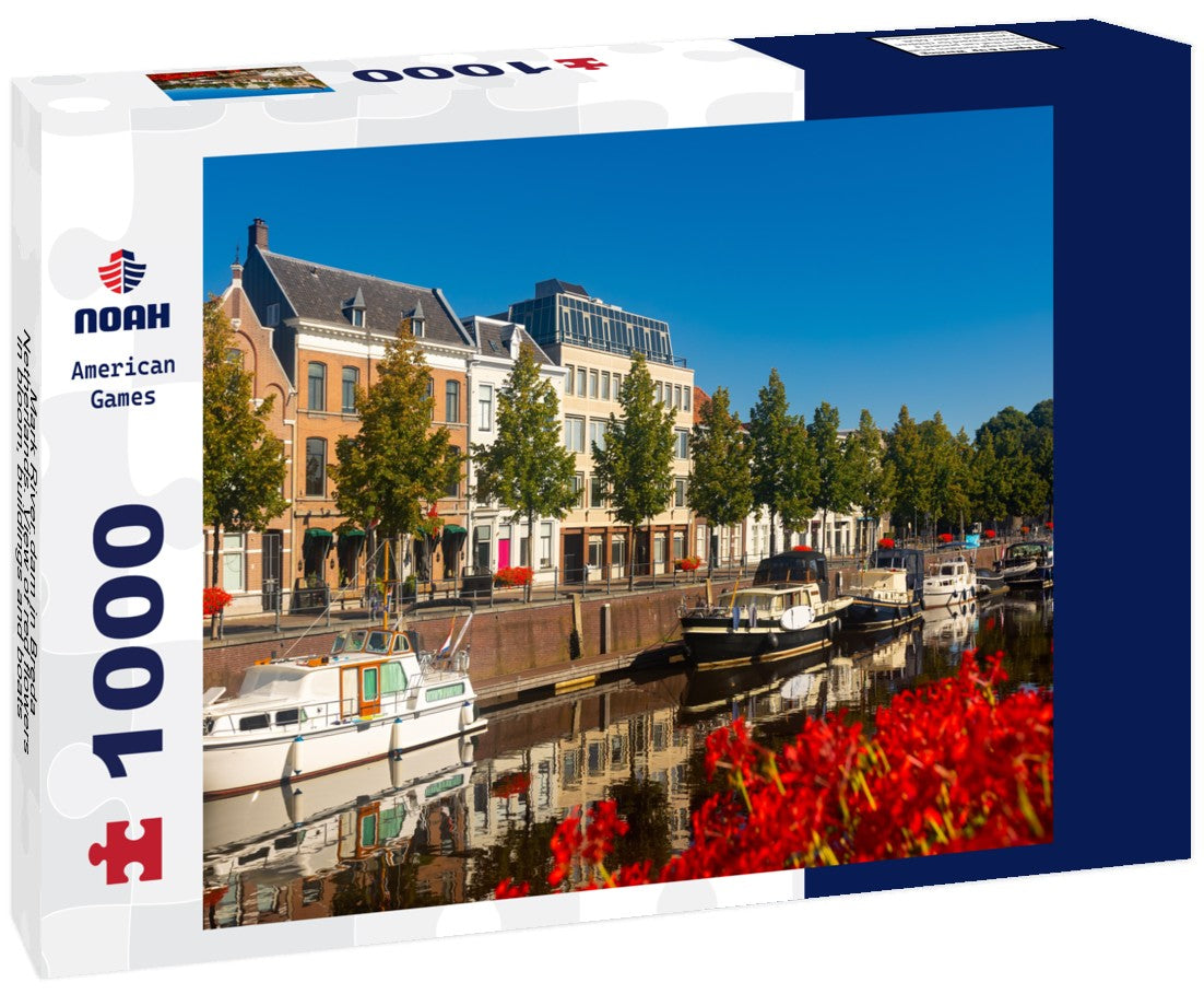 Noah Jigsaw Puzzle Mark River dam in Breda, Netherlands. View of red flowers in bloom, buildings and boats along the river banks 1000 pieces