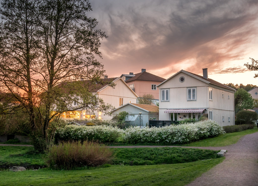 Sunset lights the houses in Molndal, suburb Gothenburg city, Sweden