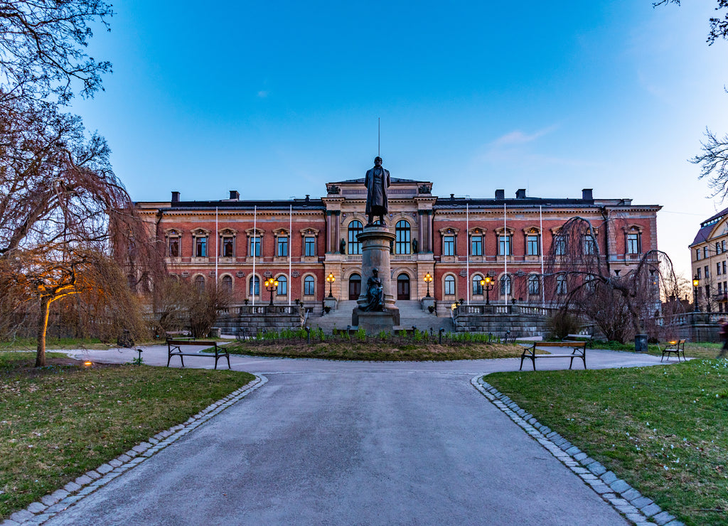 Sunset view of Statue of Erik Gustaf Geijer in front of the university of Uppsala in Sweden