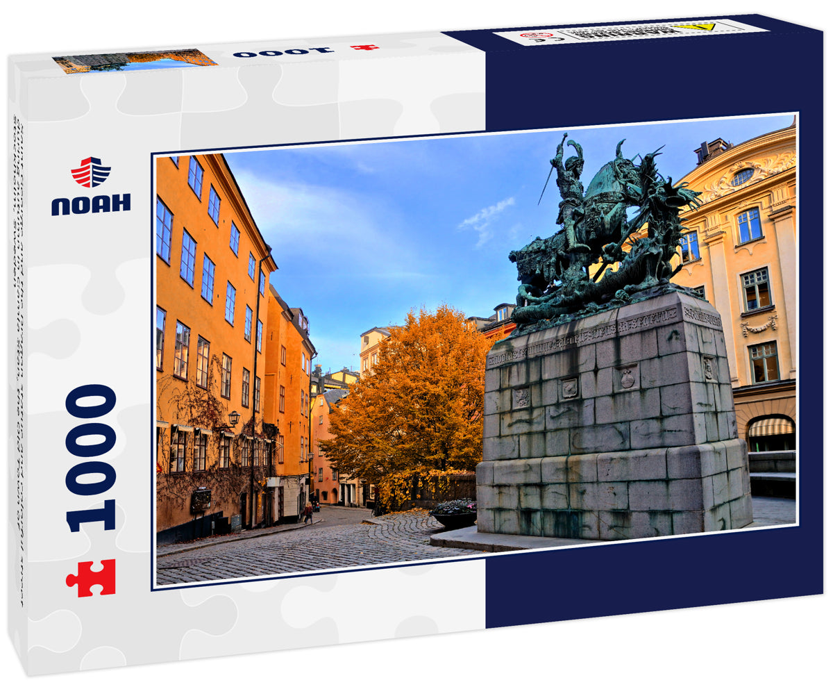 Saint George and the Dragon statue and colorful street during autumn in Gamla Stan, the Old Town of Stockholm, Sweden