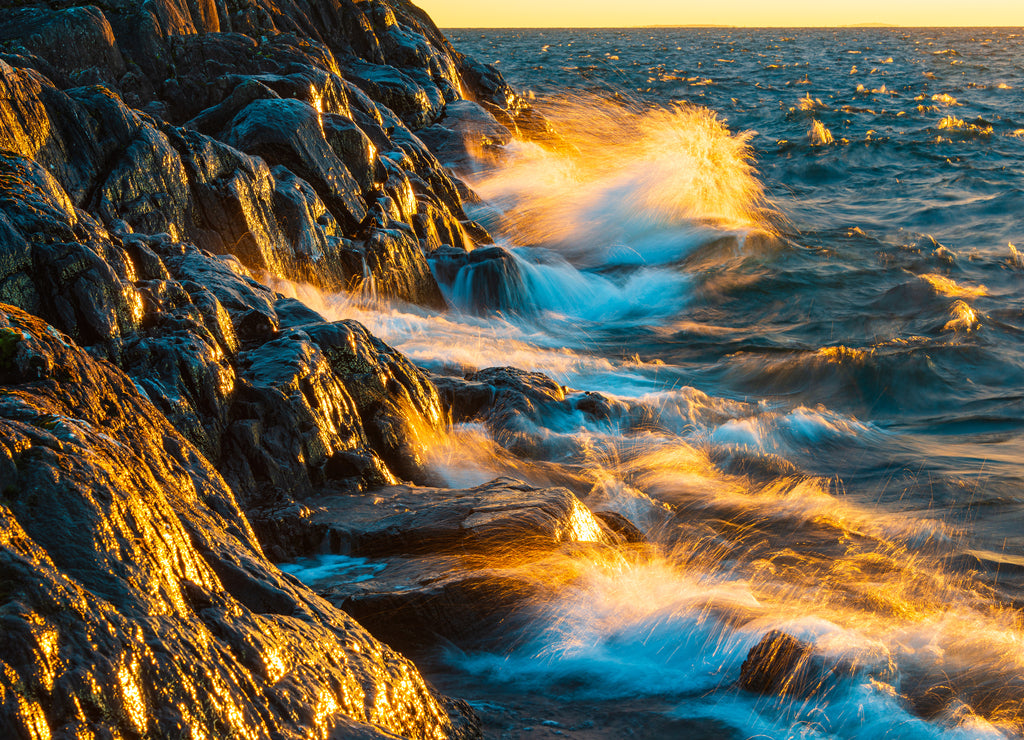 Waves crashing against shoreline at Lake Vättern, Sweden