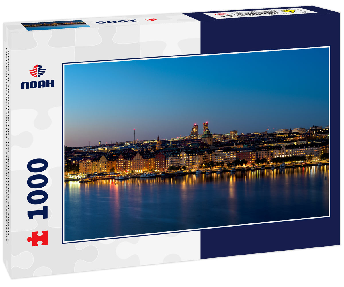 View of building by the watefront at night - Kungsholmen island in Stockholm, Sweden