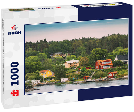 Sweden. Beautiful Red And Yellow Swedish Wooden Log Cabins Houses On Rocky Island Coast In Summer Evening