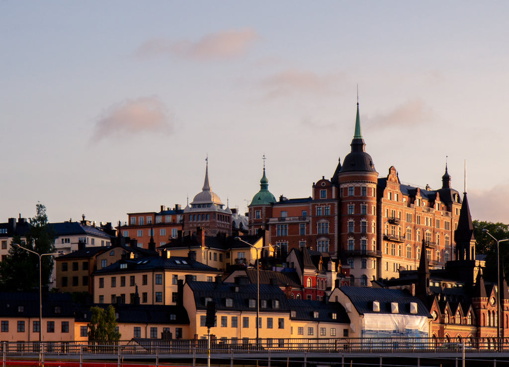 Stacked buildings on a hill in Stockholm Sweden during summer sunset