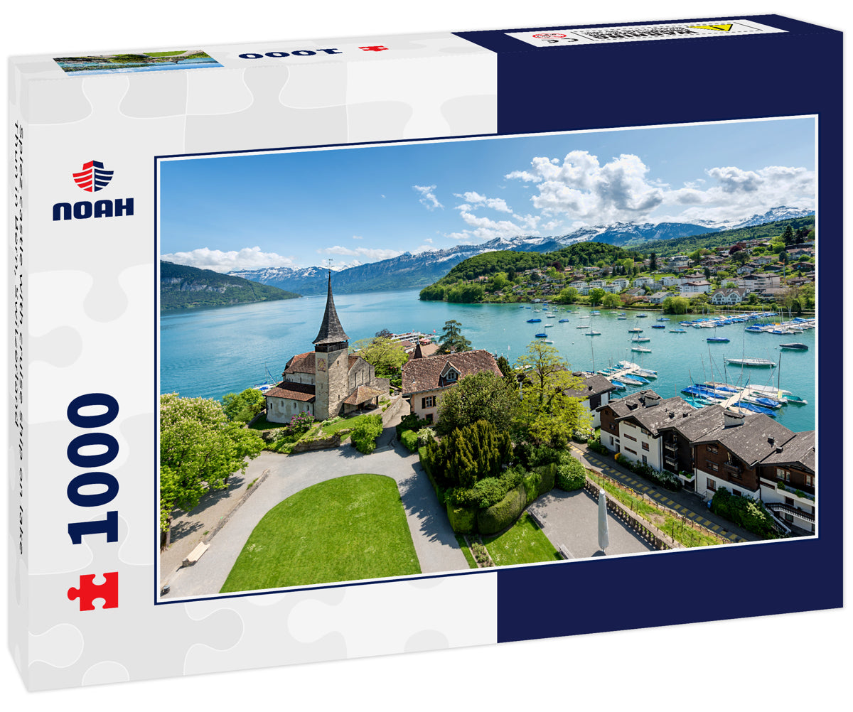 Spiez castle with cruise ship on lake Thun in Bern, Switzerland