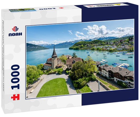 Spiez castle with cruise ship on lake Thun in Bern, Switzerland