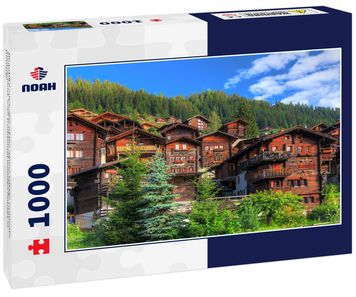 Beautiful cityscape of the alpine village Grimentz, Switzerland, with traditional wooden houses in summer