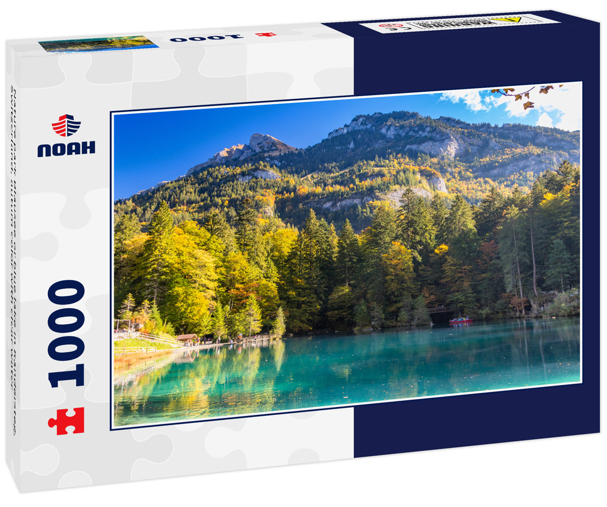 Nature park Blausee or blue lake in Kandersteg, Switzerland, autum color with clear water