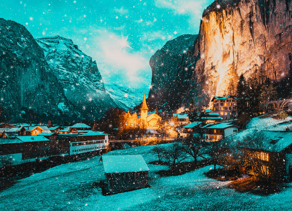 amazing touristic alpine village at night in winter with famous church and Staubbach waterfall Lauterbrunnen Switzerland Europe