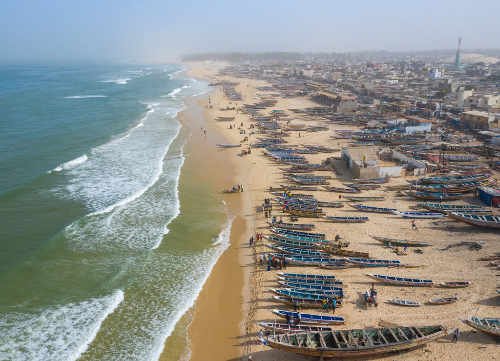 Aerial view of fishing village, pirogues fishing boats in Kayar, Senegal