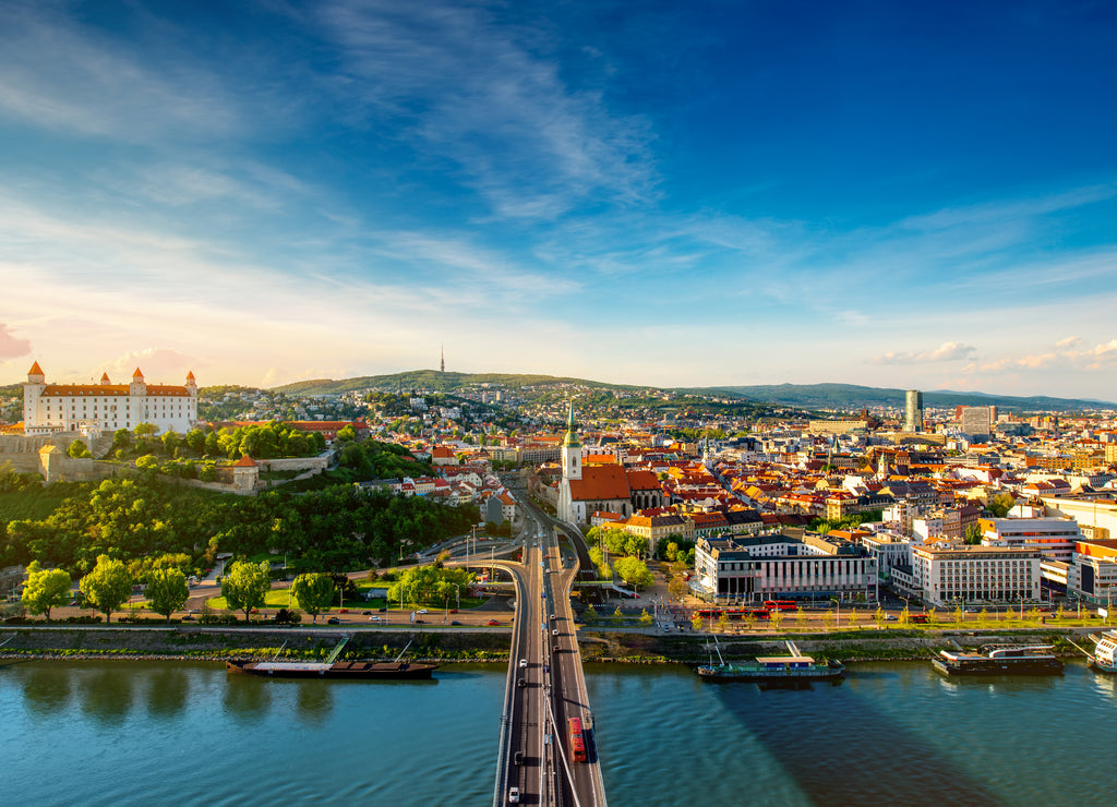 Bratislava aerial cityscape view on the old town with Saint Martin's cathedral, castle hill and Danube river on the sunset in Slovakia