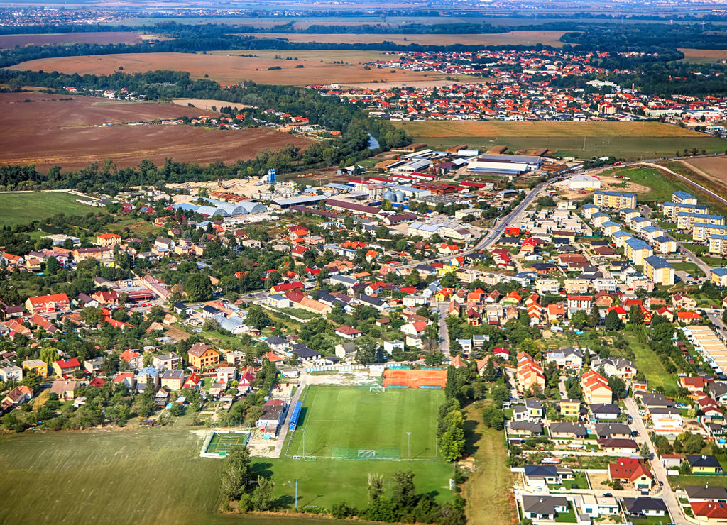 Top view of a village, agricultural field and soccer field near Bratislava, Slovakia