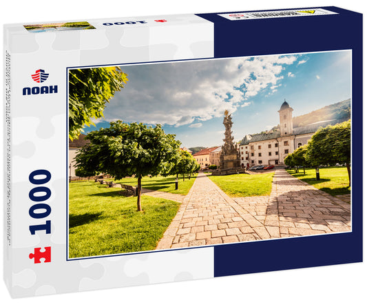 Historical town square in mining city Kremnica in Slovakia. The outlook to castle and St. Catherine church in the town