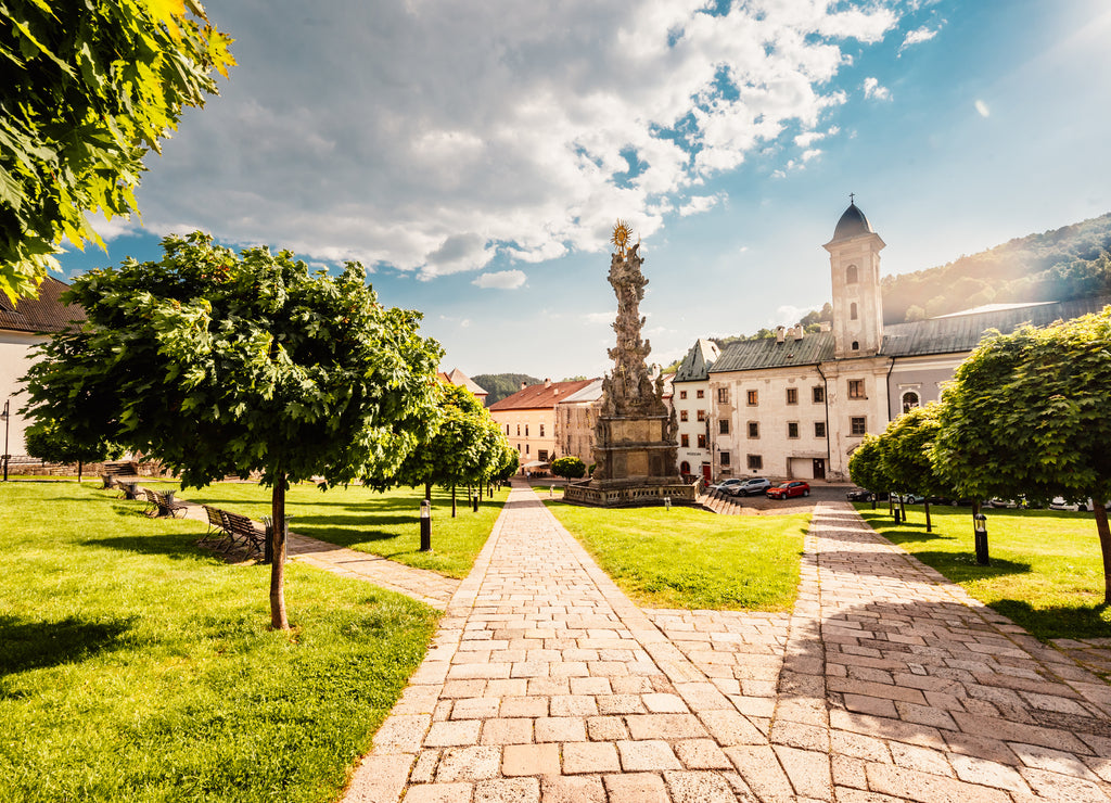Historical town square in mining city Kremnica in Slovakia. The outlook to castle and St. Catherine church in the town