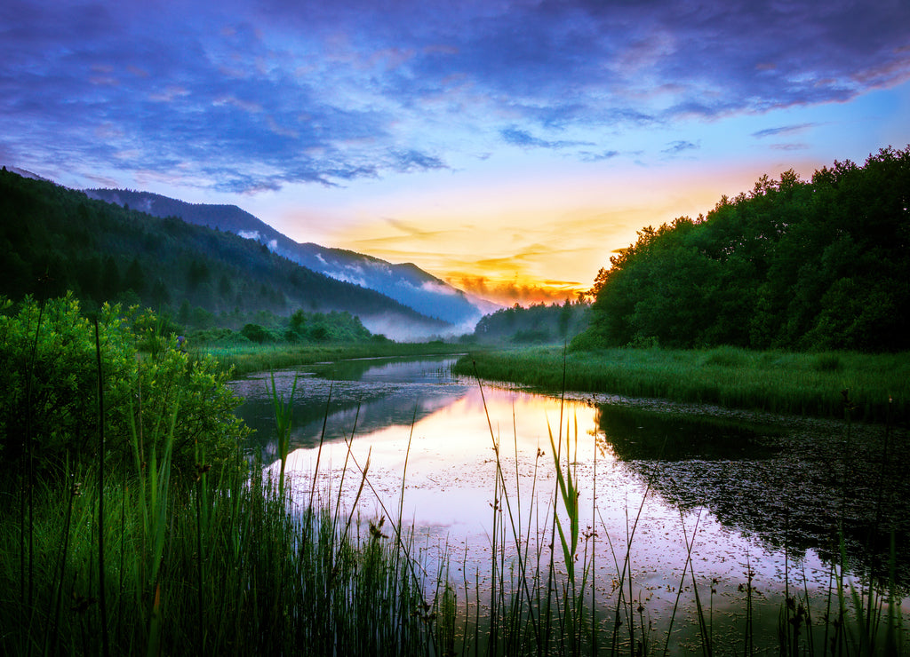 Sunset over the Ribnica river in Slovenia