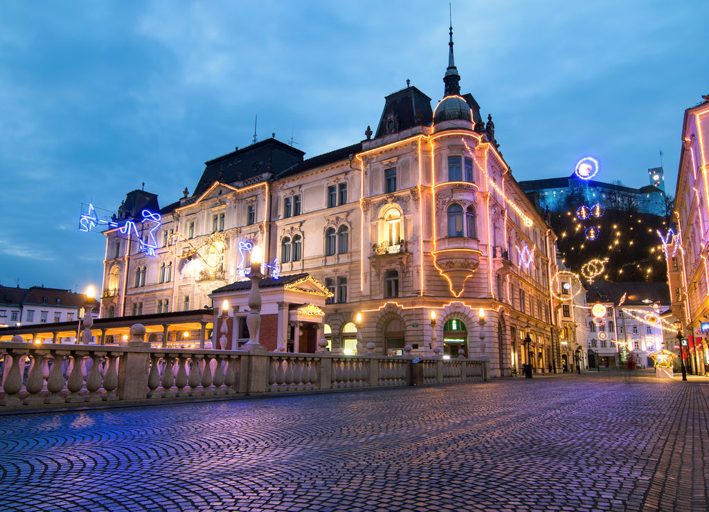 Triple bridges, Christmas tree on Preseren's square and Franciscan church, illuminated for Christmas and New Year's celebration, Ljubljana, Slovenia