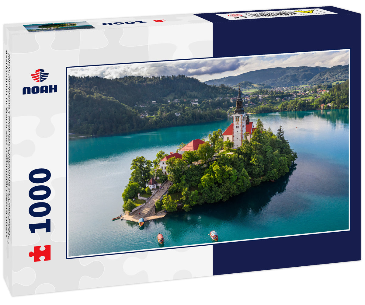 Bled, Slovenia - Beautiful morning at Lake Bled (Blejsko Jezero) with the Pilgrimage Church of the Assumption of Maria and traditional Pletna boats