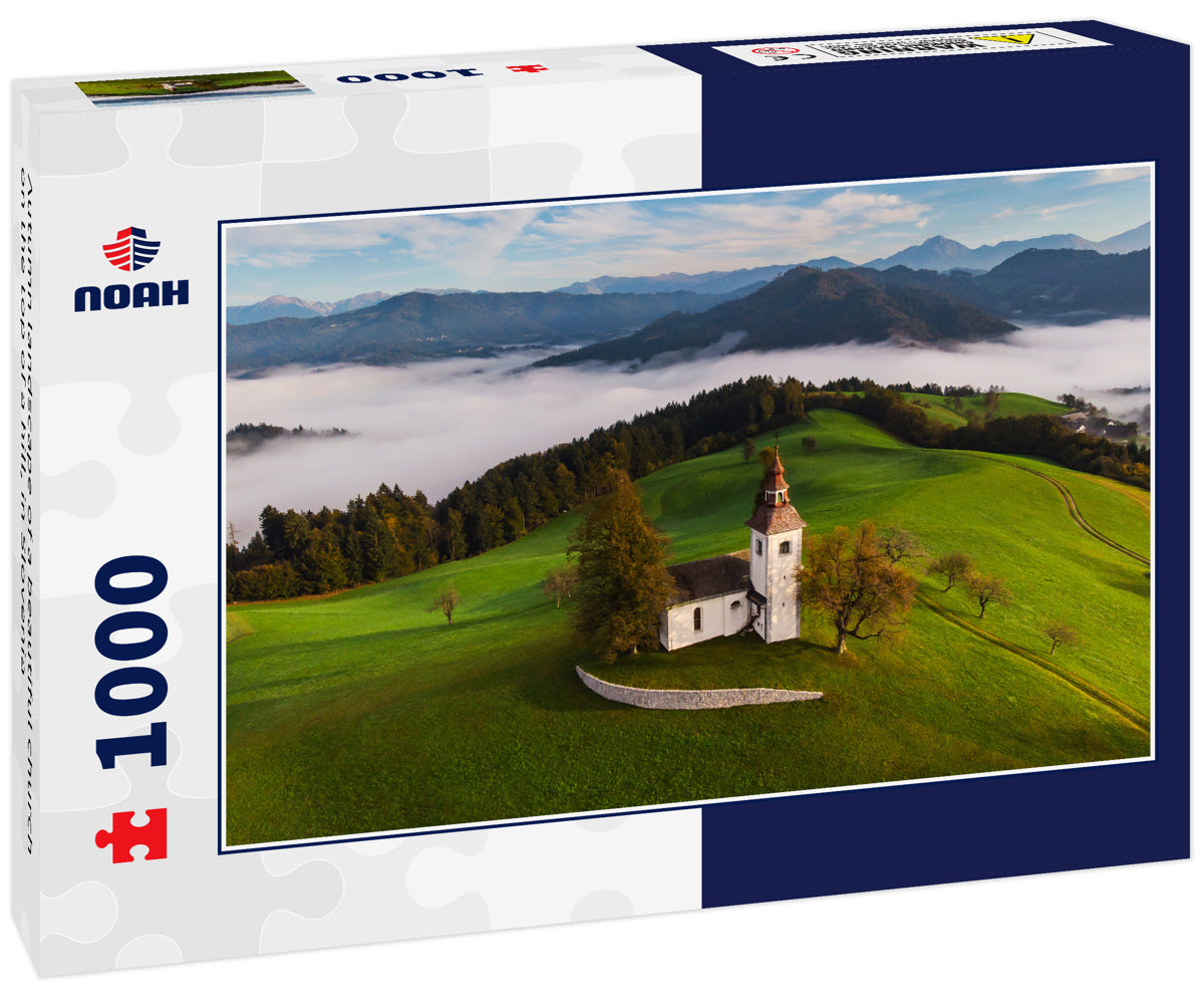 Autumn landscape of a beautiful church on the top of a hill, in Slovenia