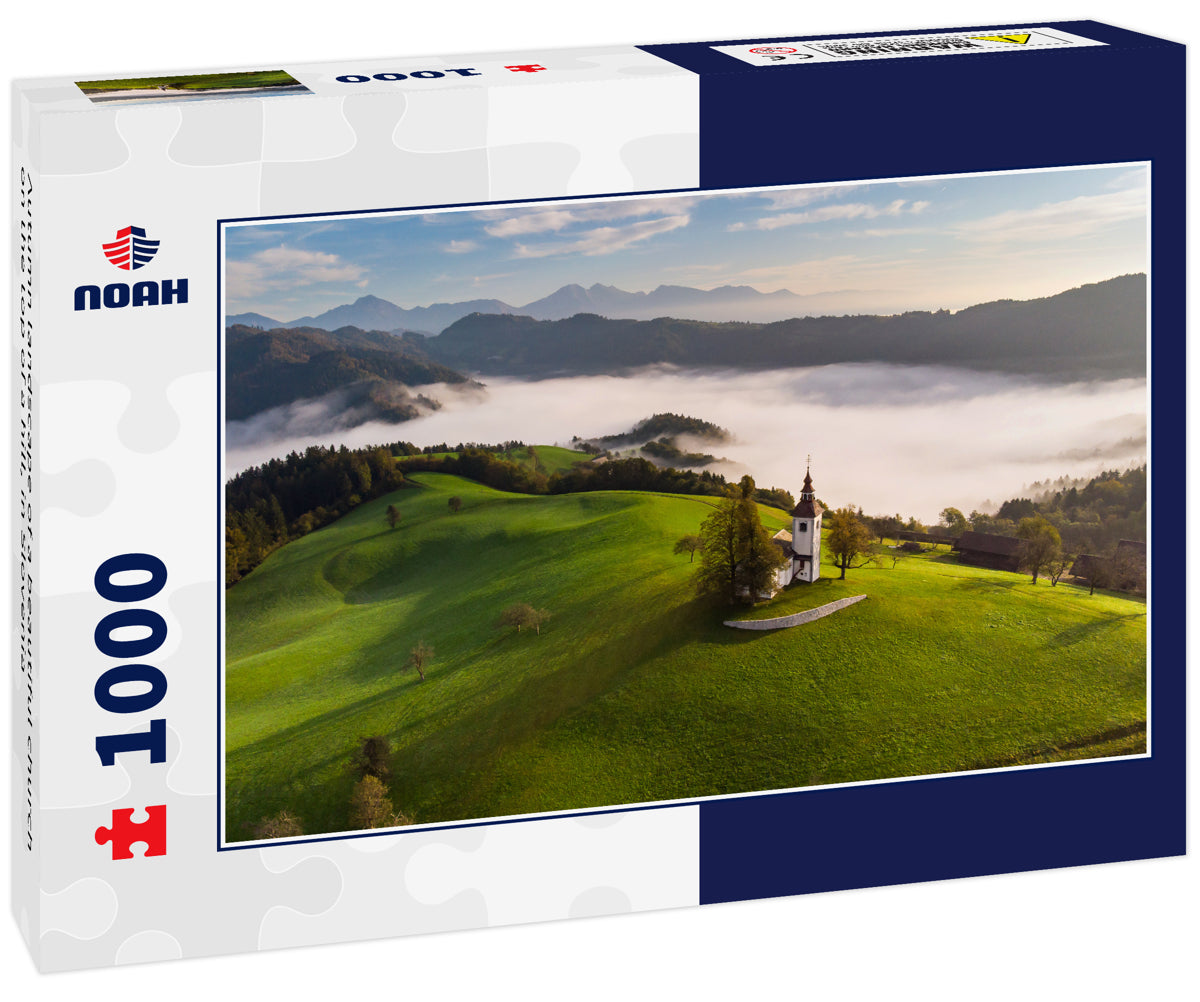 Autumn landscape of a beautiful church on the top of a hill, in Slovenia