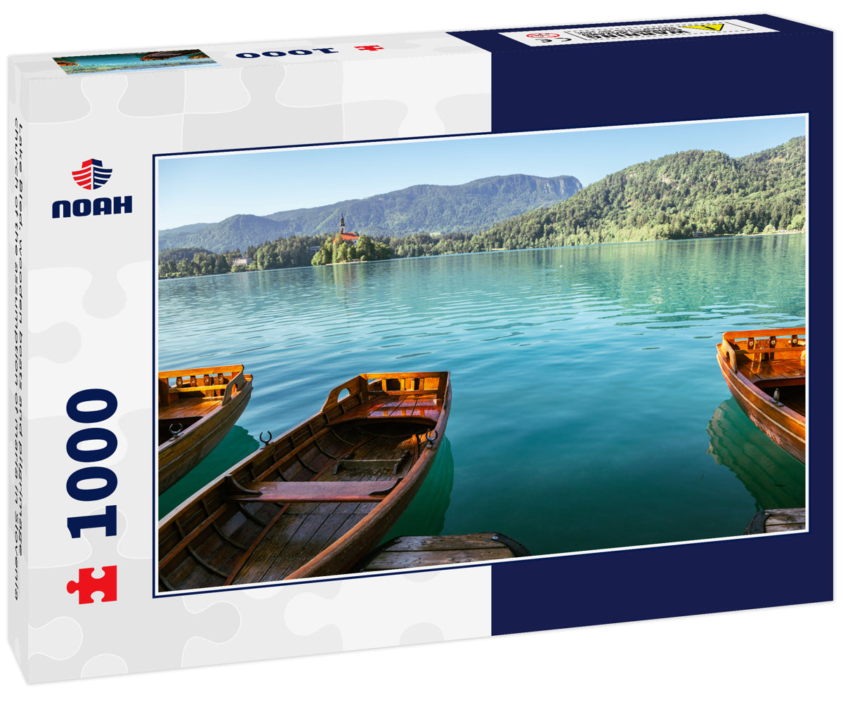 Lake Bled, wooden boats and pilgrimage church of the assumption of maria in Slovenia