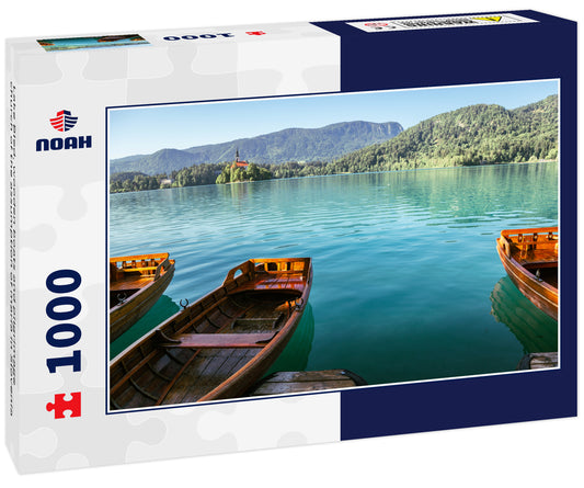 Lake Bled, wooden boats and pilgrimage church of the assumption of maria in Slovenia