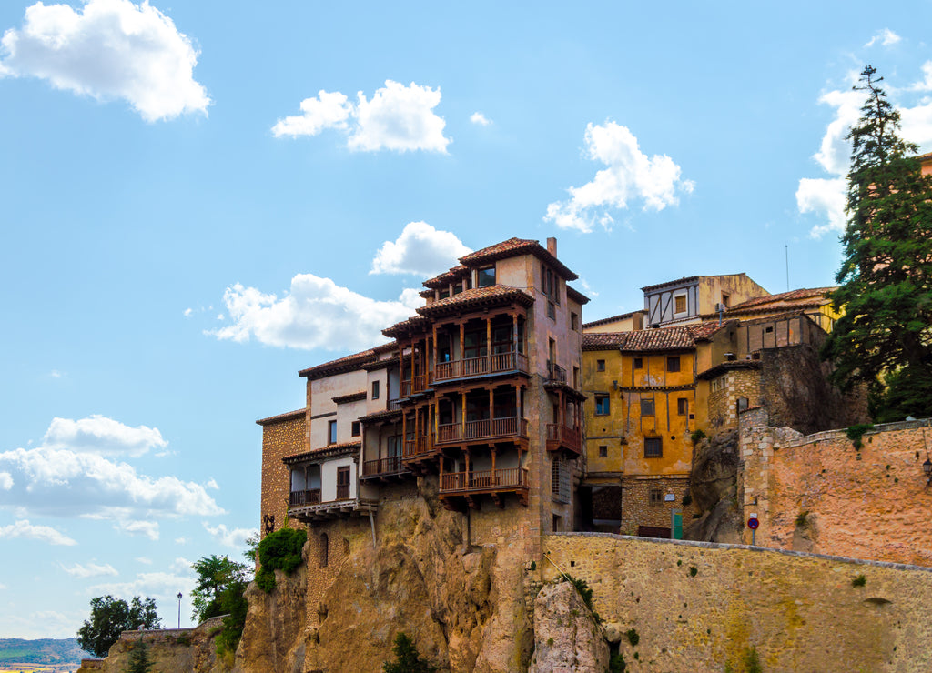 Beautiful cityscape of the picturesque Hanged Houses (Casas Colgadas) in Cuenca, Spain. Curious houses built on the rocks of a cliff