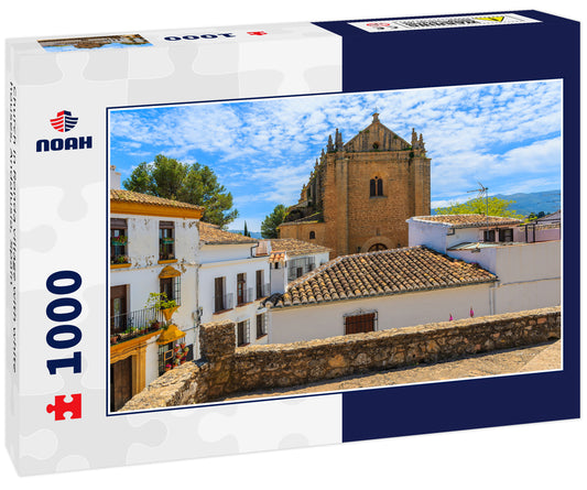 Church in Ronda village with white houses, Andalusia, Spain