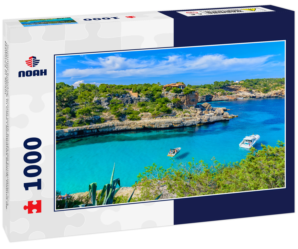 Summer holiday scene with boats on turquoise sea water of Mallorca in Cala Llombards beach, Palma de Mallorca in Spain