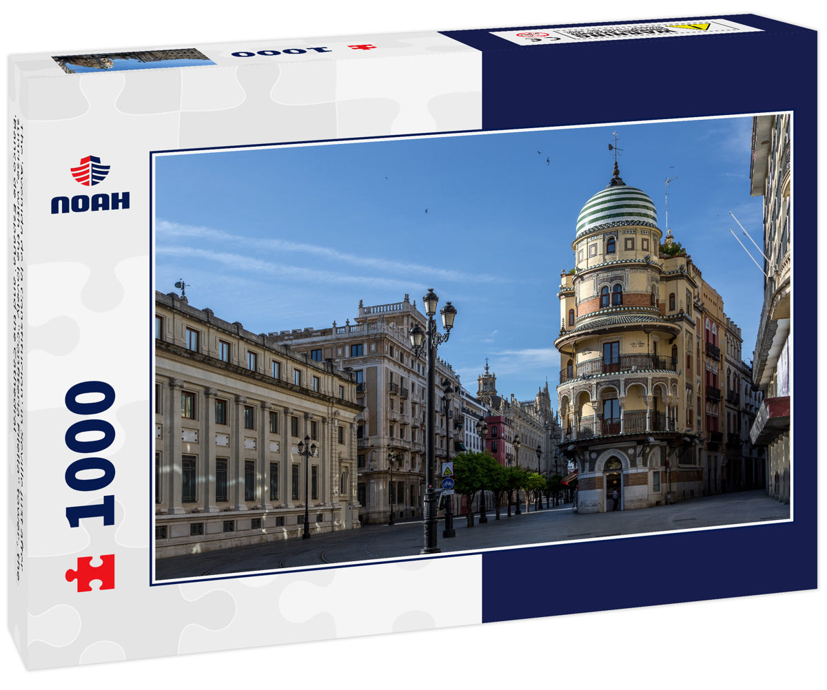 The 'Avenida de la Constitucion' in Seville just after sunrise, with the lovely "Confiteria Filella" tower , the 'Banco de España' and the Cathedral