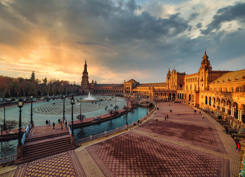 Dramatic scene of Plaza España in Seville at sunset