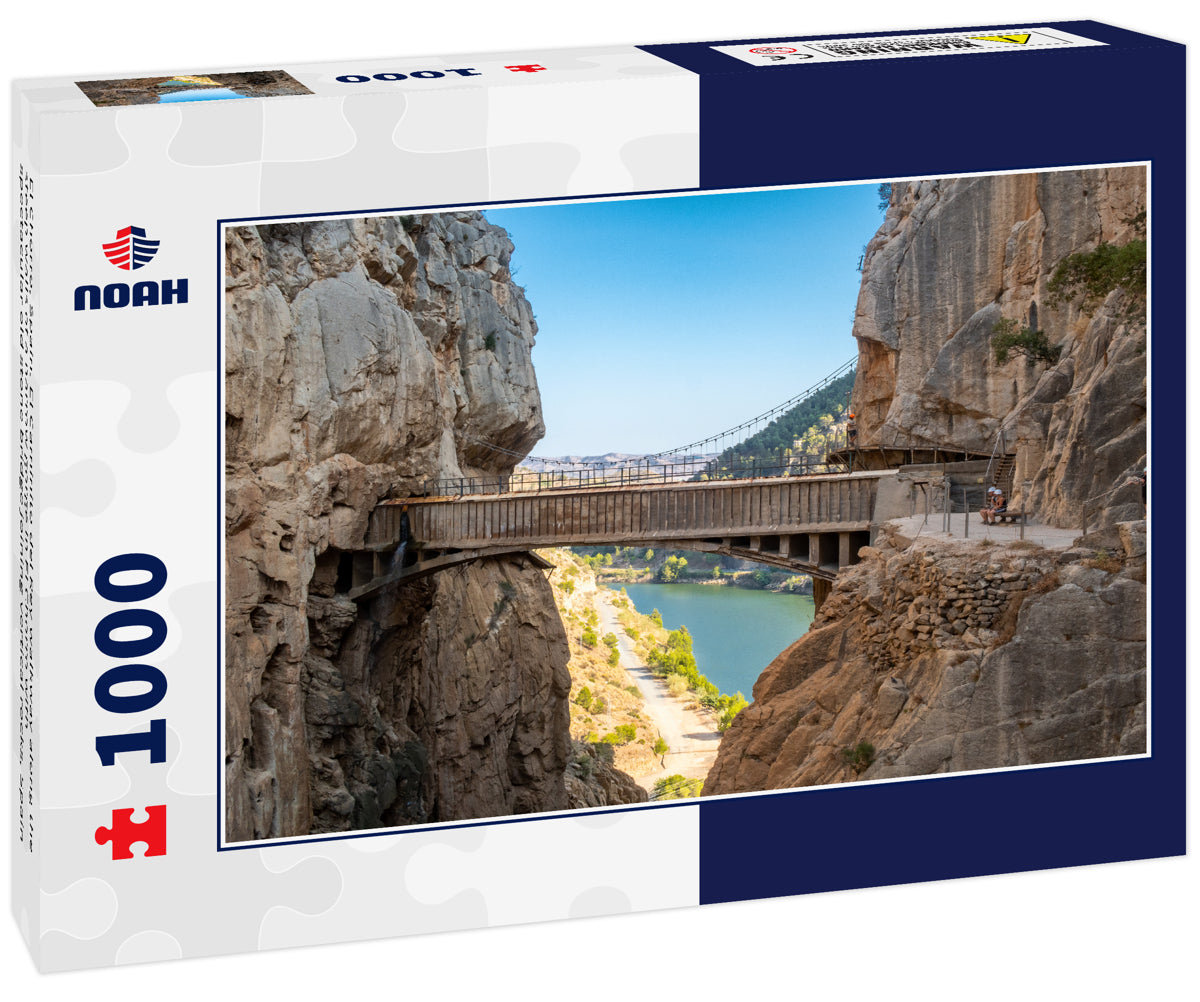 El Chorro, Spain. El Caminito del Rey walkway along the steep walls of a narrow gorge in El Chorro with spectacular old stone bridge joining vertical rocks, Spain