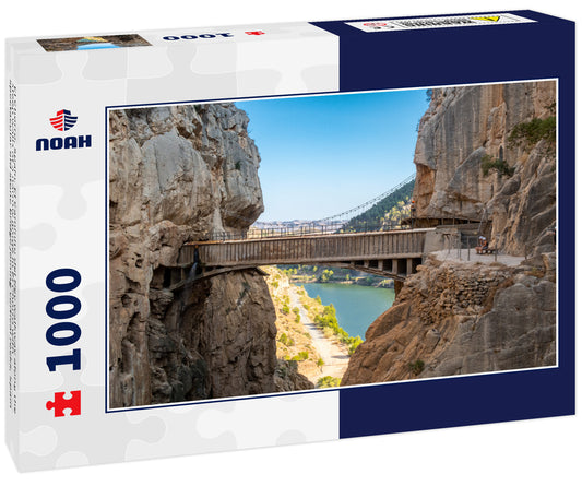 El Chorro, Spain. El Caminito del Rey walkway along the steep walls of a narrow gorge in El Chorro with spectacular old stone bridge joining vertical rocks, Spain