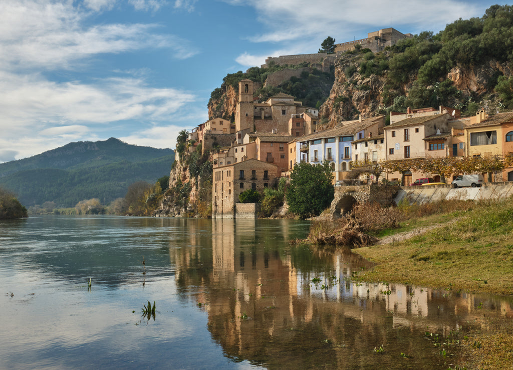 Miravet village and its Templar castle on top of the hill on the banks of the Ebro river, Tarragona, Spain