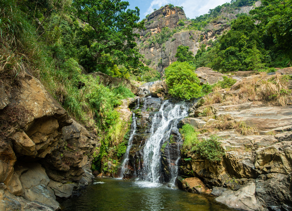 Beautiful view of Ravana Falls a popular sightseeing attraction in Ella a mountain town in the central highland of Sri Lanka. This waterfall measures approximately 25 m (82 ft) in height