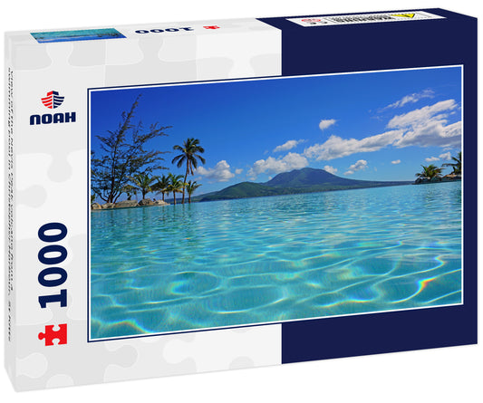 View of the Nevis Peak volcano from a swimming pool in Christopher Harbour, St Kitts