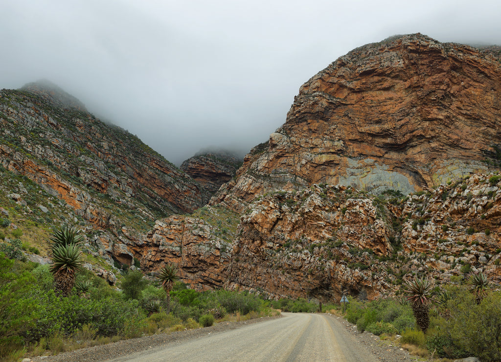 Majestic rocky redish mountains in Seweweekspoort pass