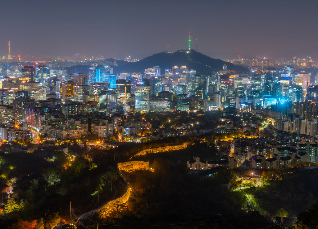 Namsan tower viewed behind an ancient wall at Inwangsan mountain in Seoul, Republic of Korea