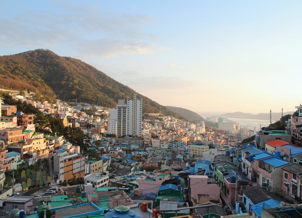 Gamcheon Culture Village which is houses built in staircase-fashion on the foothills of a coastal mountain during sunset in autumn, Busan, South Korea
