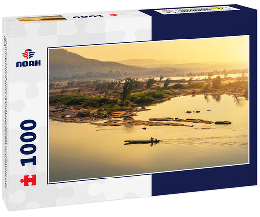 wooden fishing boat sailing in mekong river on sunrise at khongjiam district of thailand border of thailand and laos