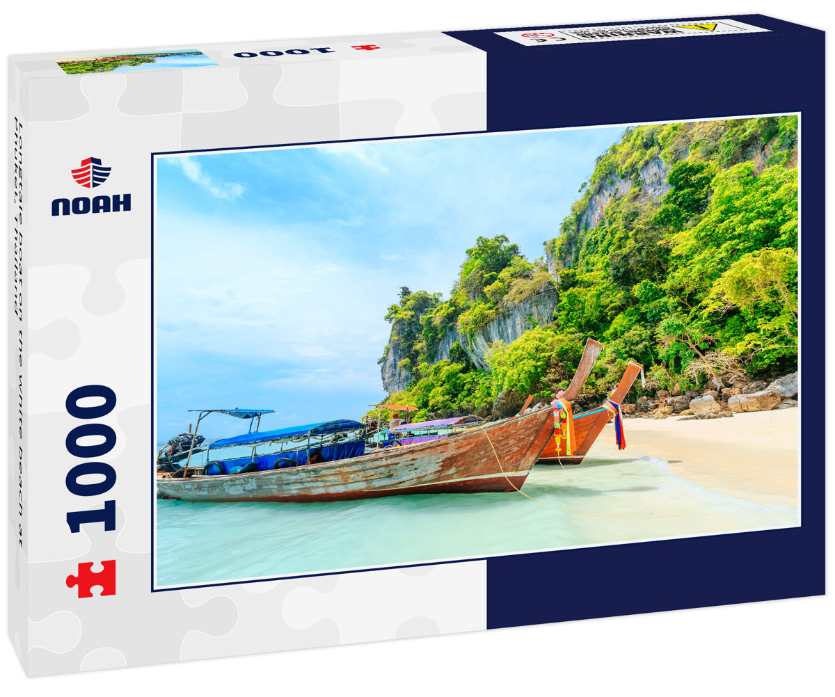 Longtale boat on the white beach at Phuket, Thailand