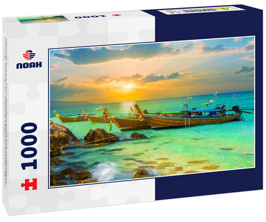 Vibrant sunset over Bamboo island of Thailand in summer holiday on tropical beach of Phi Phi region