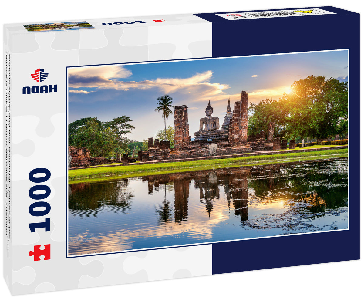 Buddha statue and Wat Mahathat Temple in the precinct of Sukhothai Historical Park, Wat Mahathat Temple is UNESCO World Heritage Site, Thailand