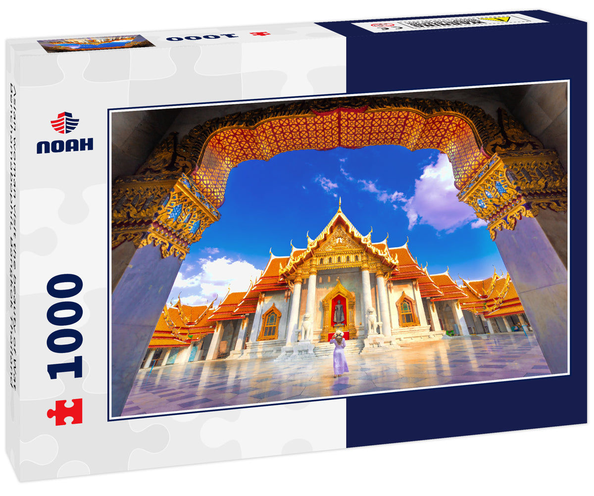 Asian woman visit the beauty of Wat Benchamabophit, Bangkok Thailand