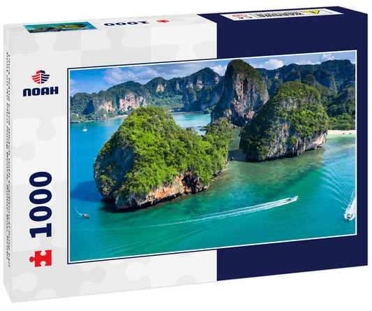 Phra Nang Cave Beach with traditional long tail boat on Ao Phra Nang Beach, Railay Bay, Krabi