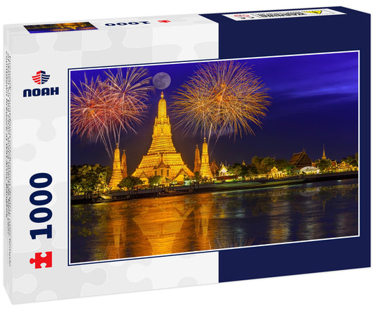 Firework countdown celebration display over temple of dawn on the Chao Praya riverside.New year countdown firework at Wat Arun, Bangkok