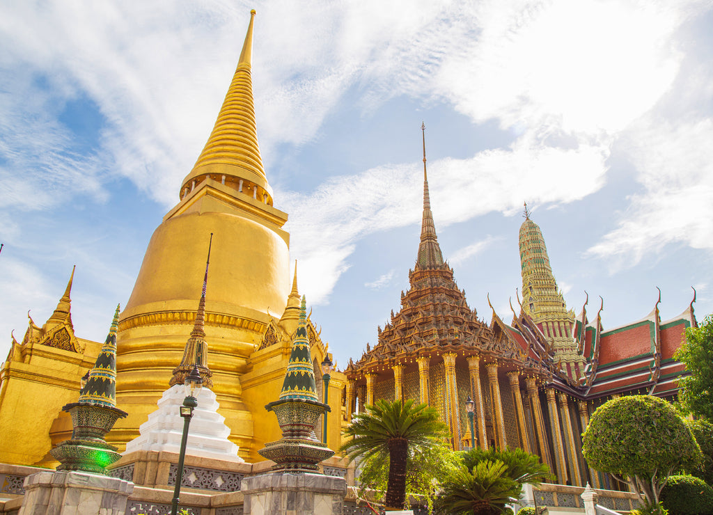 Picture inside of the Emerald Buddha Temple and the Grand Palace with The great pagoda and church against the sky, This is an important Buddhist temple and a famous tourist destination of Bangkok