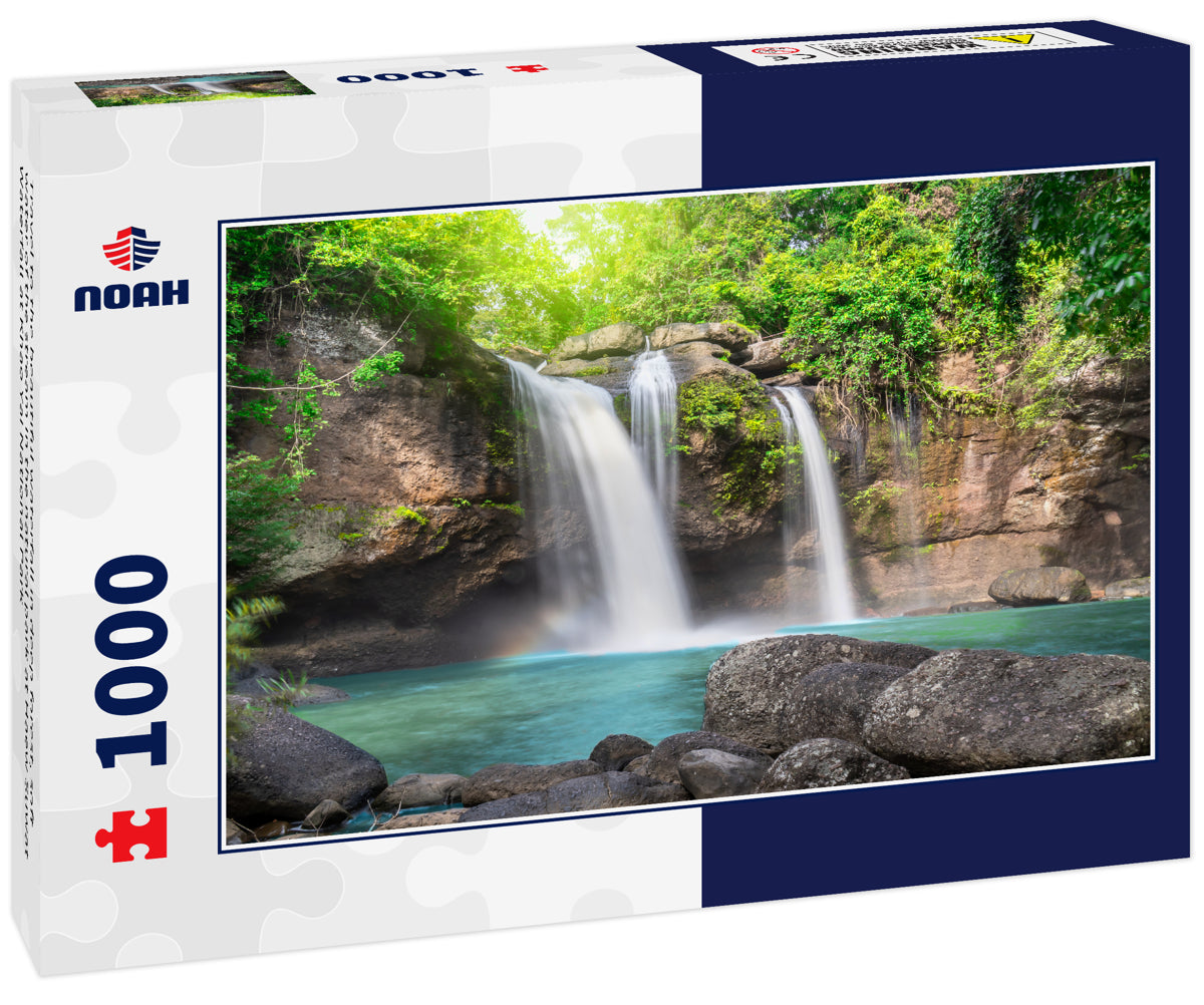 Travel to the beautiful waterfall in deep forest, soft water of the stream in the natural park at Haew Suwat Waterfall at Khao Yai National Park