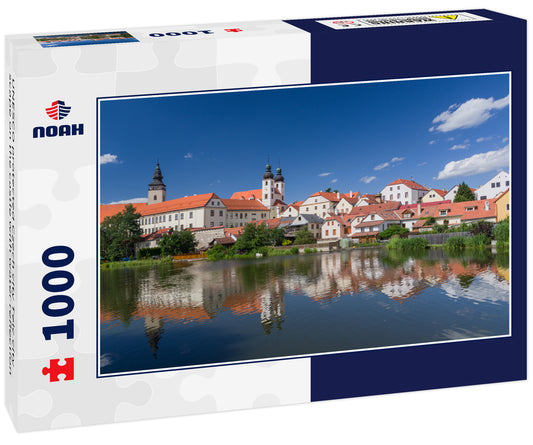 UNESCO protected Czech city Telc city scape on the castle with water reflection