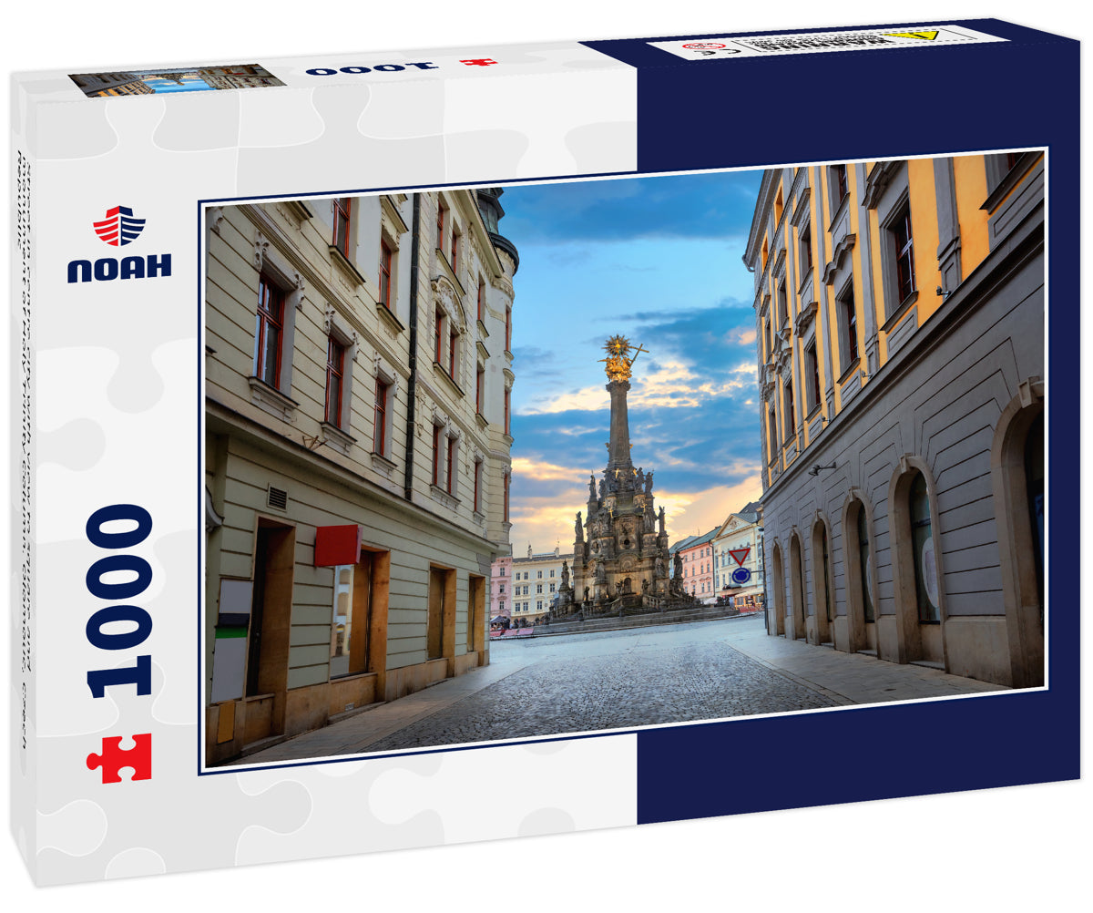 Street in centre city with view to square and monument of Holy Trinity Column. Olomouc, Czech Republic